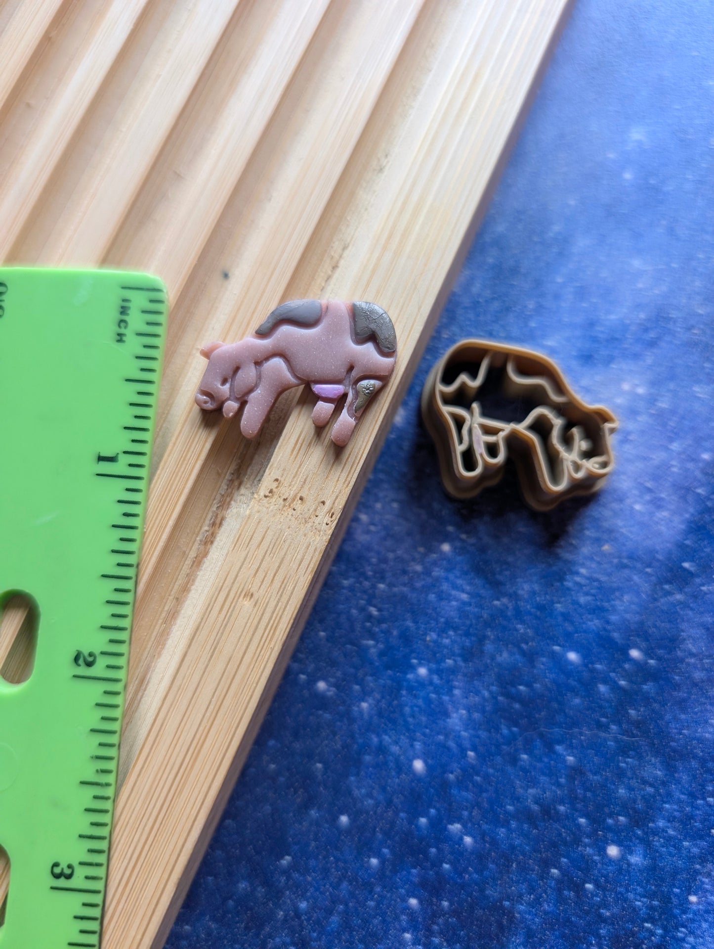 Small Cow Grazing Sharp Clay Cutter