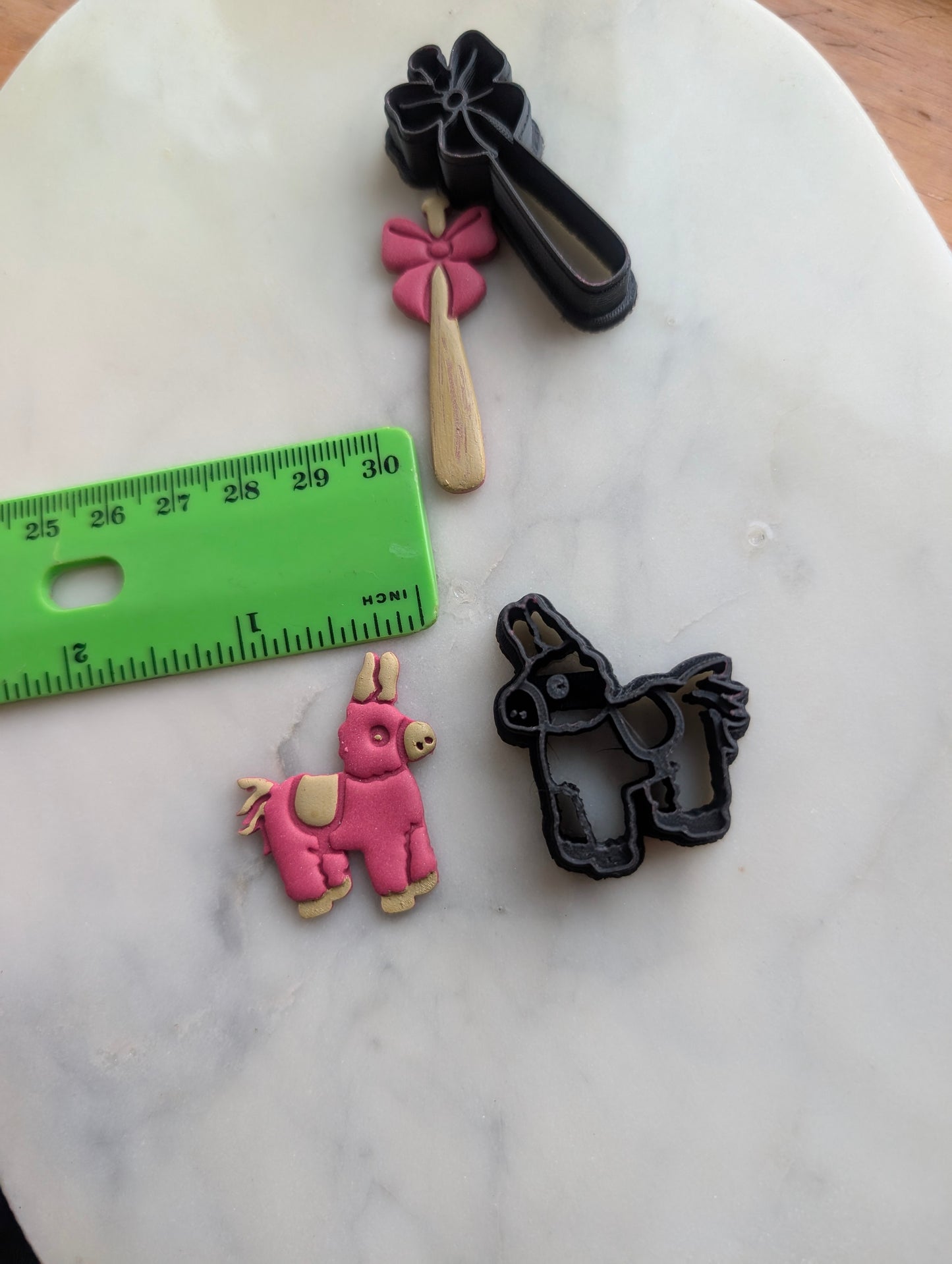 Donkey Piñata and Bat with Bow Sharp Clay Cutter