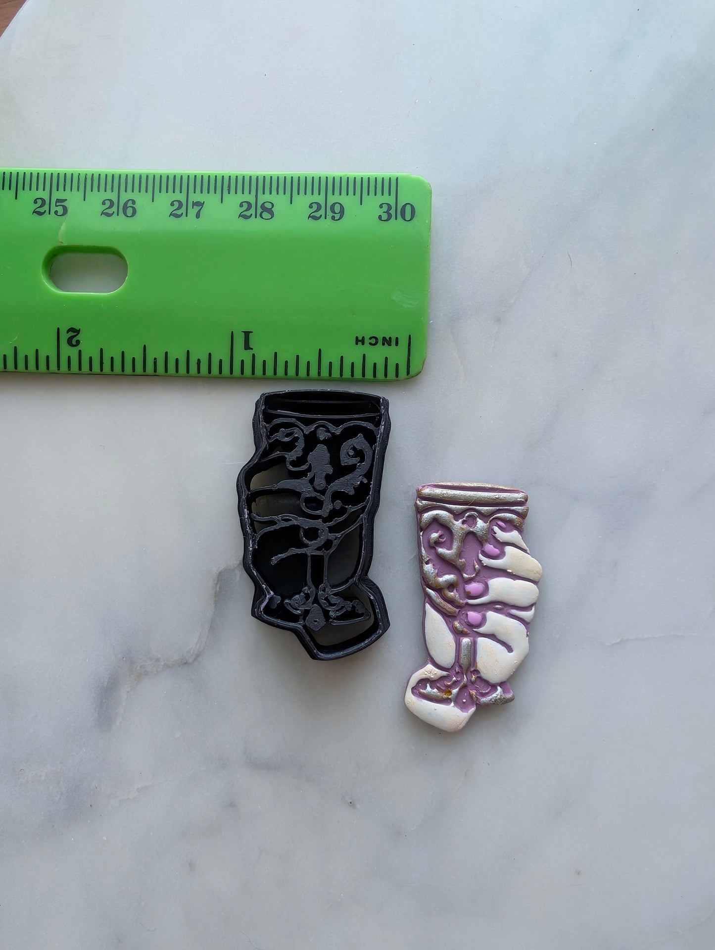 Hand Holding a Fancy Goblet Sharp Clay Cutter