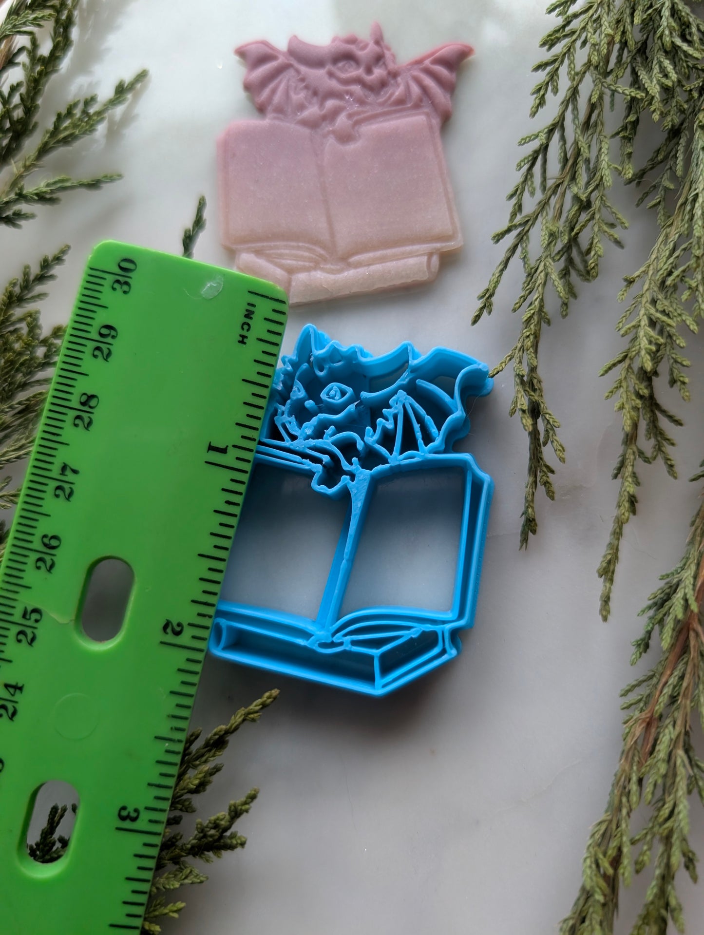 Dragon Behind Open Book Stack Sharp Clay Cutter