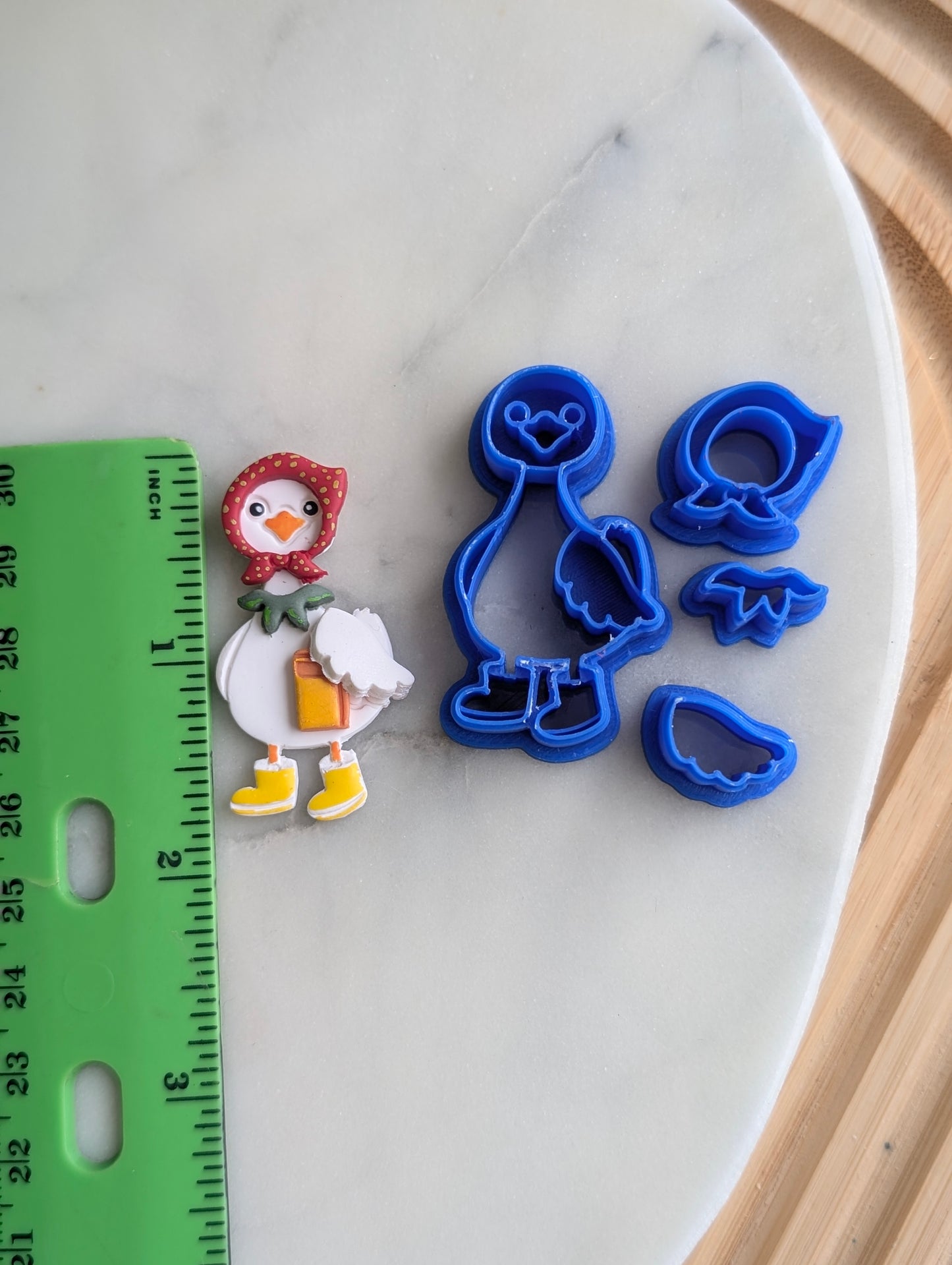 Goose Wearing a Bonnet and Rain Boots 4 Piece Sharp Clay Cutter