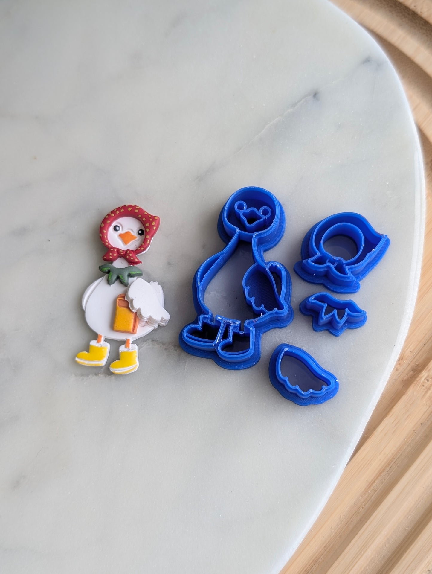 Goose Wearing a Bonnet and Rain Boots 4 Piece Sharp Clay Cutter