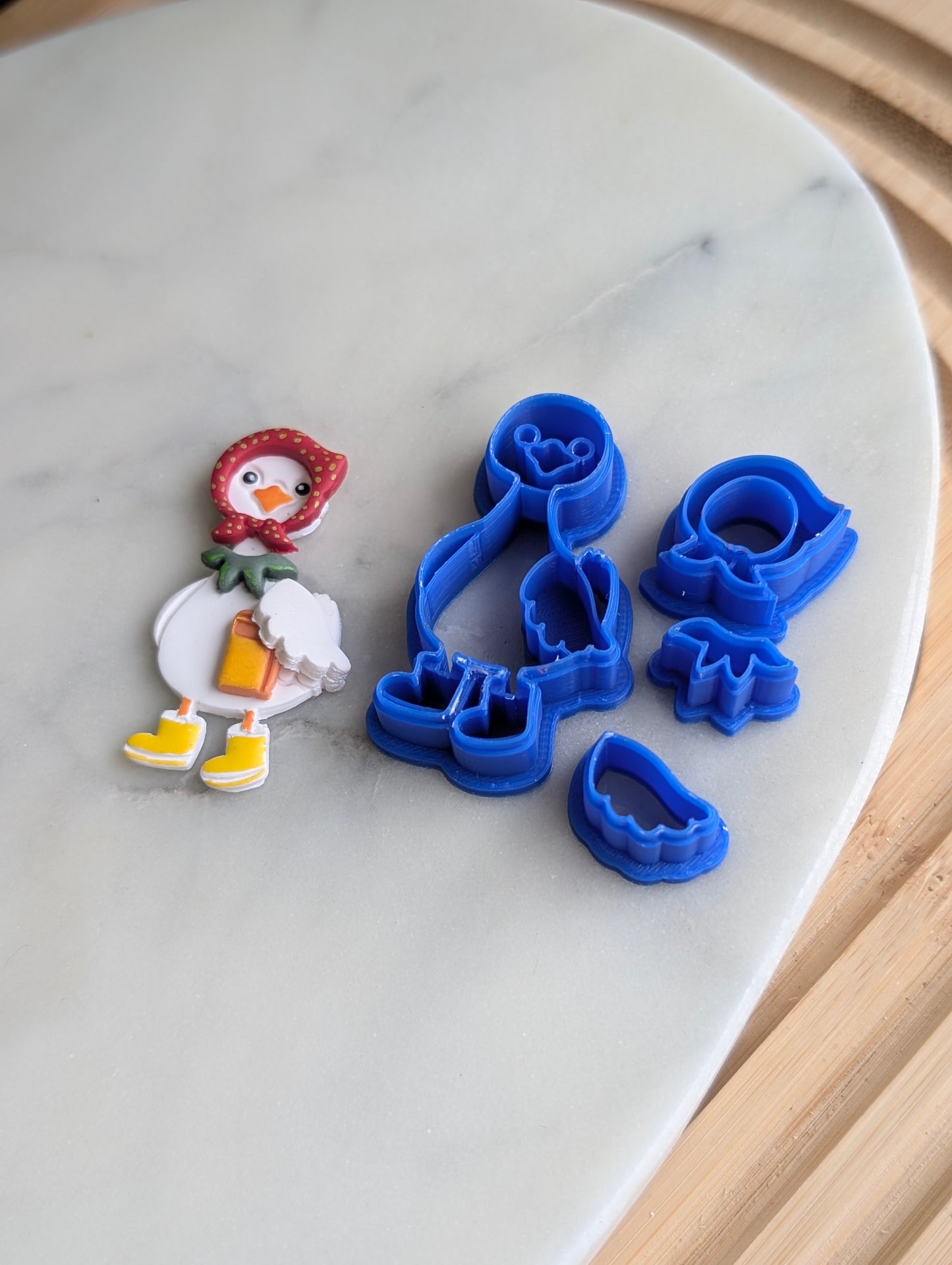 Goose Wearing a Bonnet and Rain Boots 4 Piece Sharp Clay Cutter