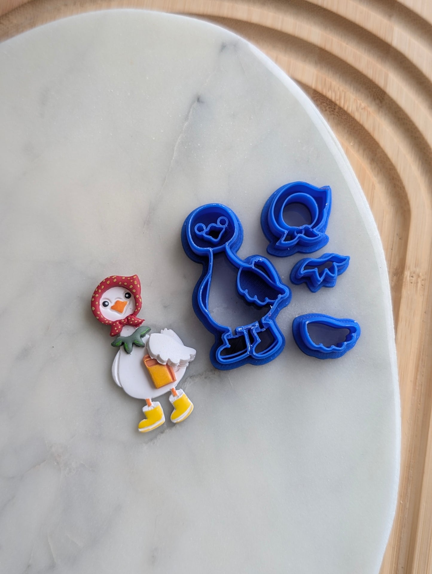 Goose Wearing a Bonnet and Rain Boots 4 Piece Sharp Clay Cutter