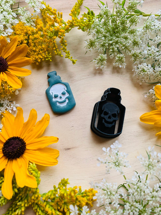 Skull in a Potion Bottle Embossed Sharp Clay Cutter