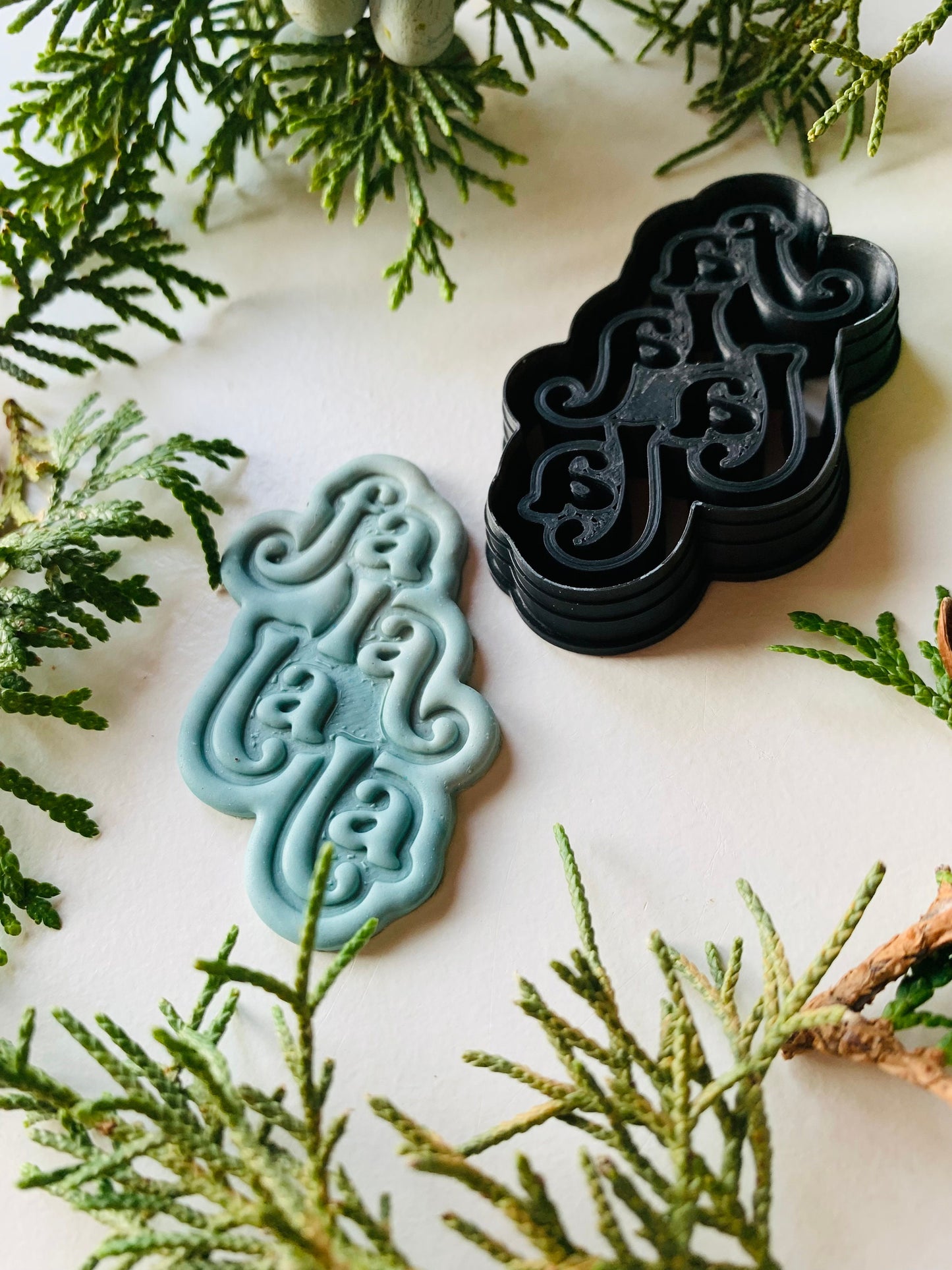 Fa La La La Stylized Text Embossed Sharp Clay Cutter
