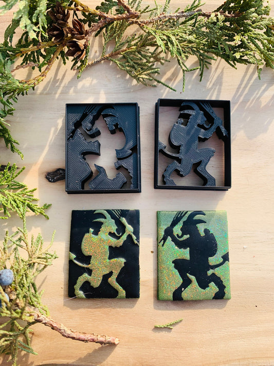 Inverted Mirrored Pair of Krampus Silhouettes Embossed Sharp Clay Cutter