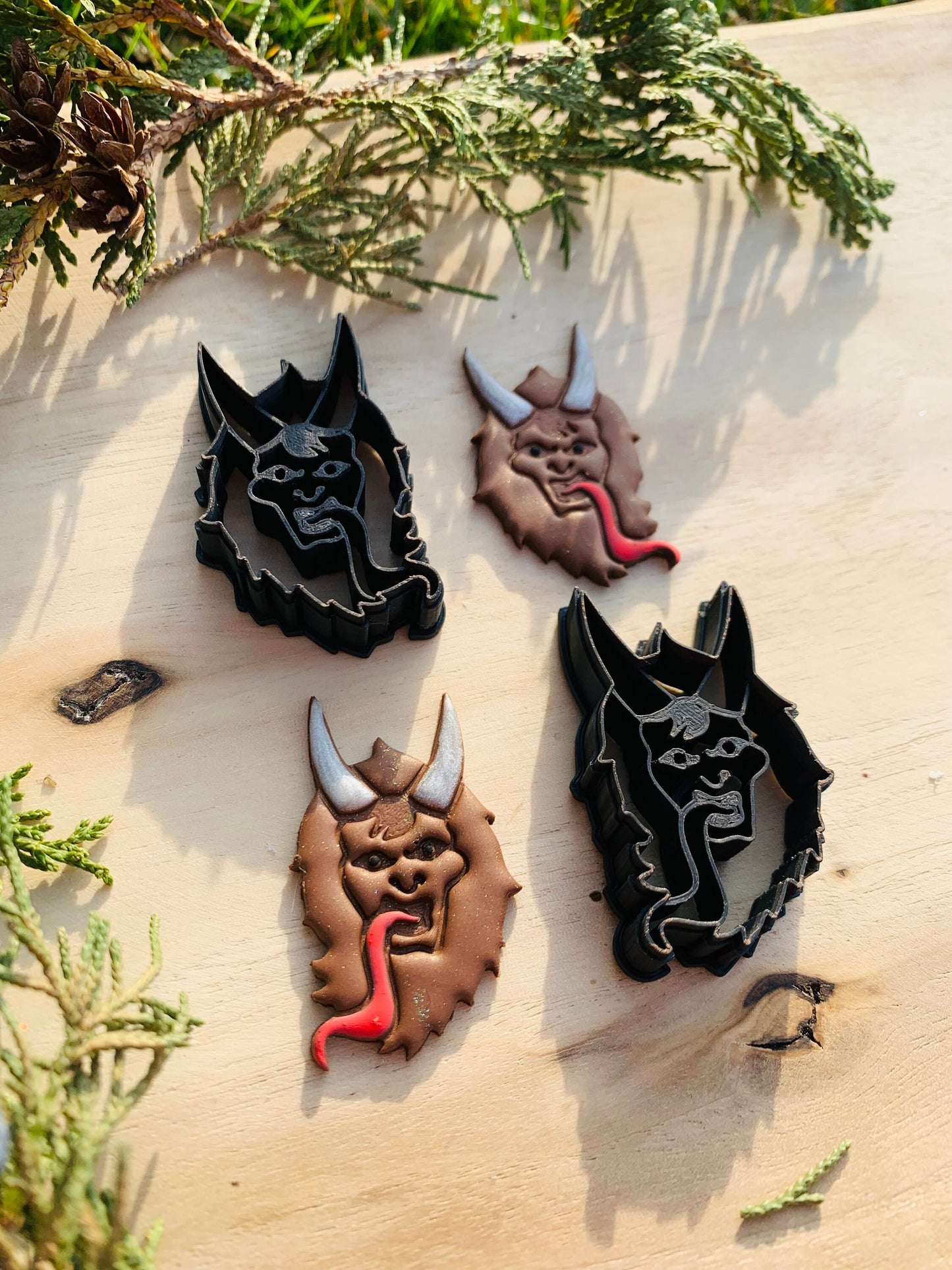 Mirrored Pair of Krampus Heads Embossed Sharp Clay Cutter