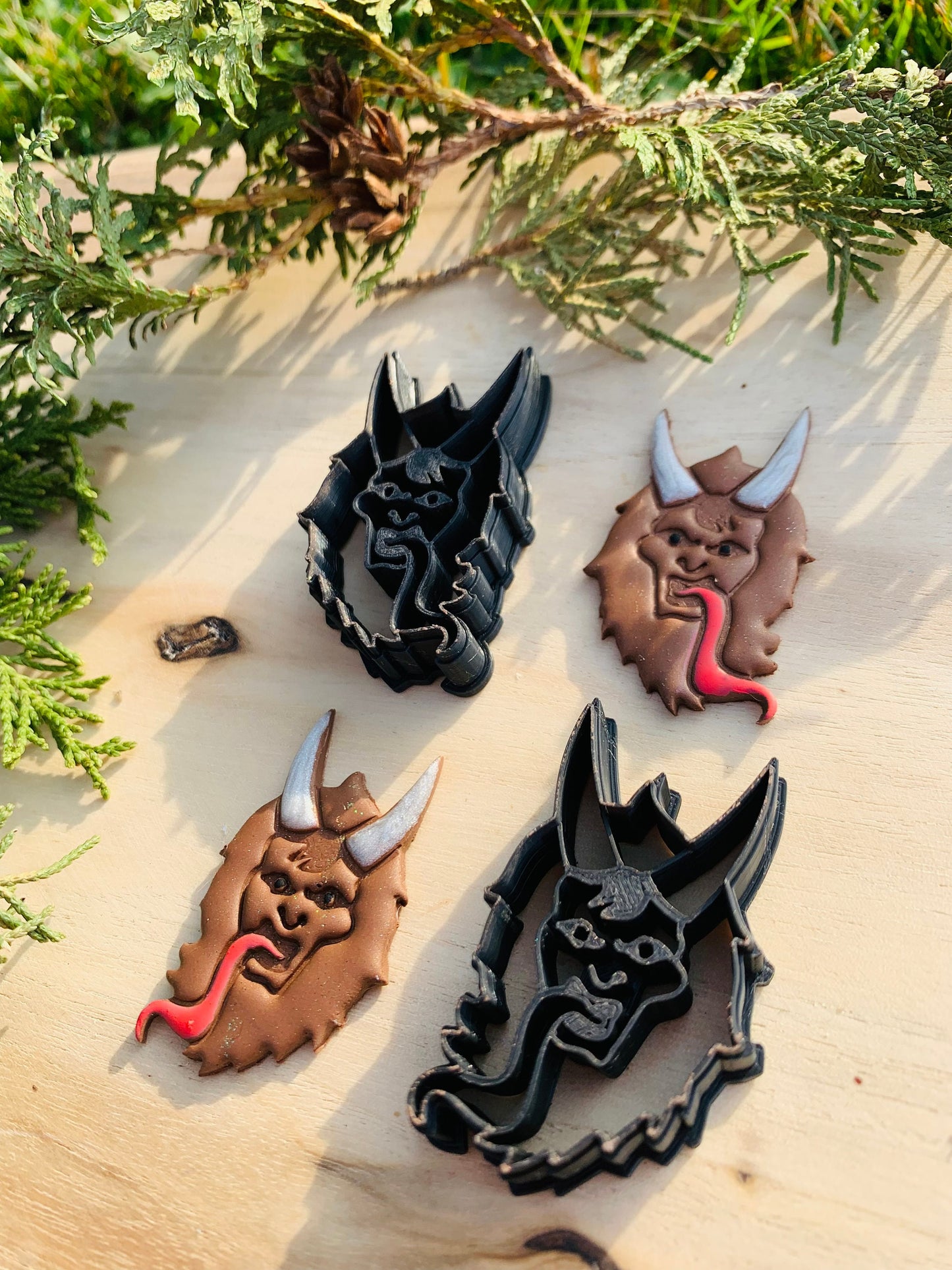 Mirrored Pair of Krampus Heads Embossed Sharp Clay Cutter