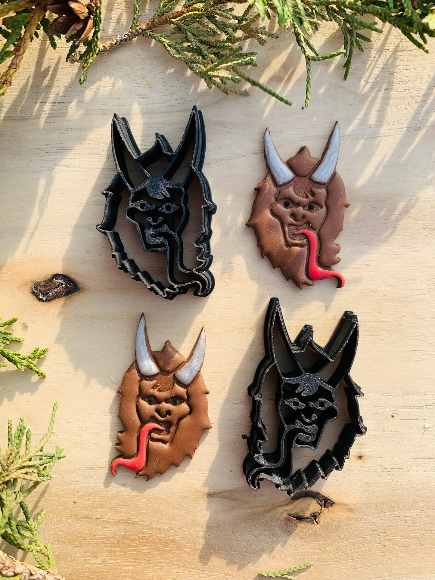 Mirrored Pair of Krampus Heads Embossed Sharp Clay Cutter